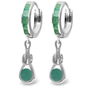 Radiant silver earrings-14K. SOLID WHITE GOLD HUGGIE EARRINGS WITH DANGLING EMERALDS