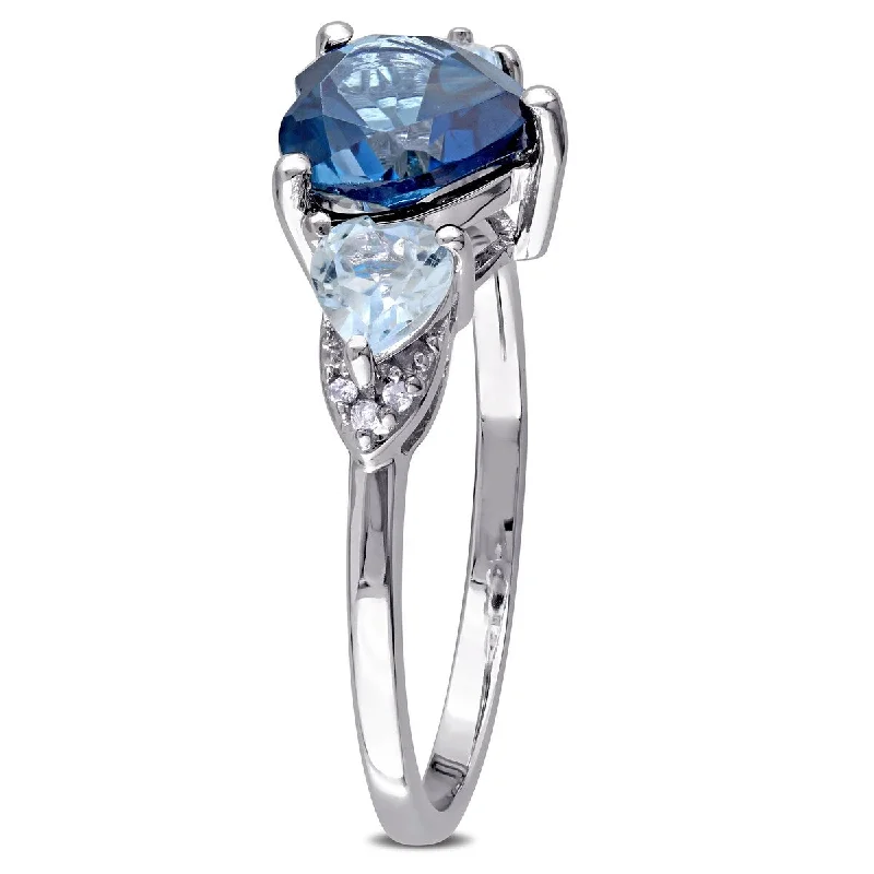 Twinkling crystal ring-Miadora 2 1/5 CT TGW Blue Topaz Diamond Accent Triple Heart Ring in Sterling Silver