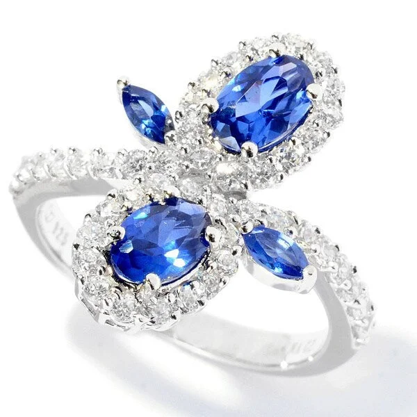 Subtle-carved ring-Platinum over Silver Blue and White Cubic Zirconia Flower Ring