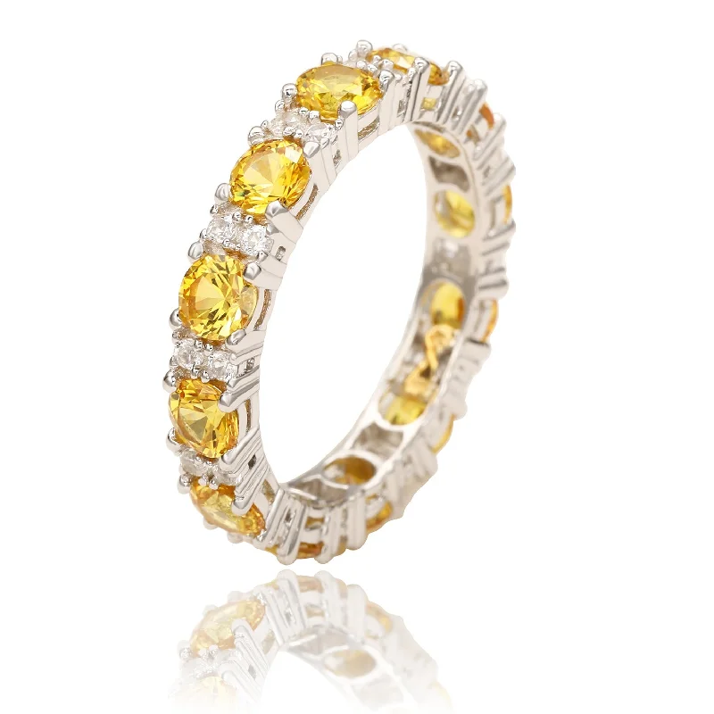 Lush moonstone ring-Suzy Levian Sterling Silver Round Cut Yellow Sapphire and Diamond Accent Eternity Band