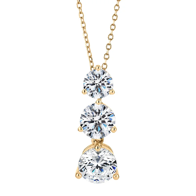 Sparkling gem necklace-Three stone drop pendant with 2.33 carats* of diamond simulants in 10 carat yellow gold