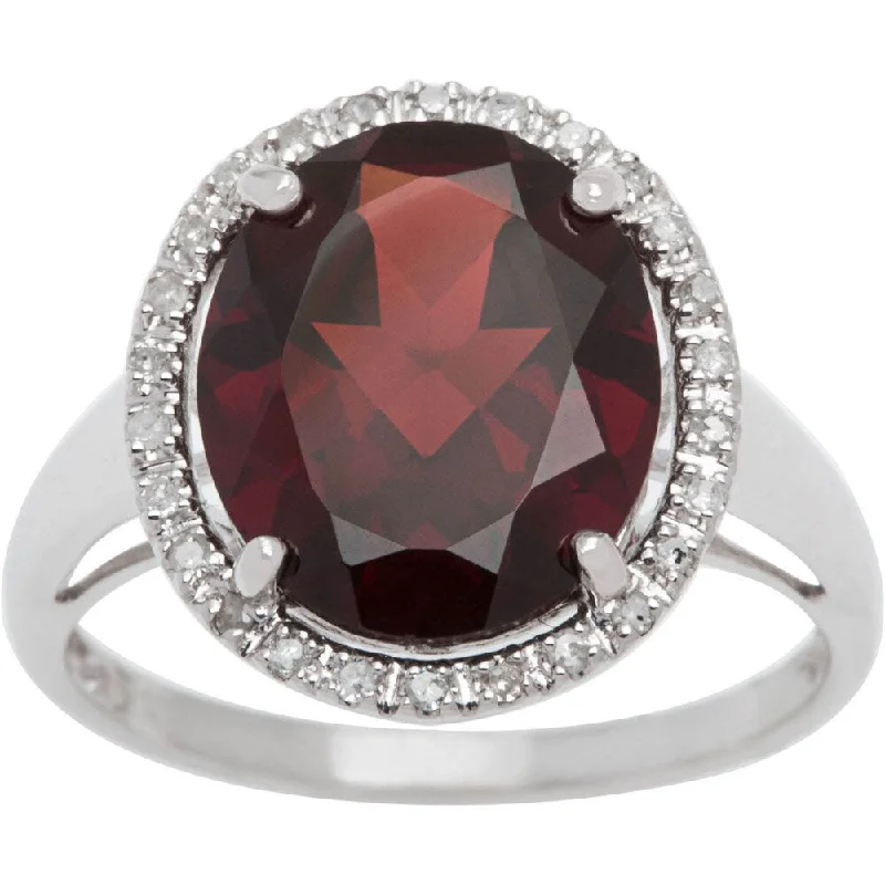 Domed cabochon ring-Viducci 10k Gold Oval Garnet and 1/6ct TDW Diamond Halo Ring (G-H, I1-I2)