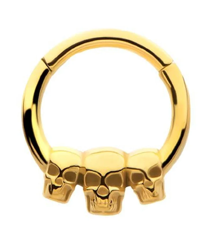 Arch motif earrings-Gold PVD Triple Skull Stainless Steel Hinged Segment Ring